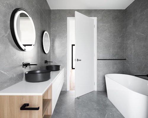 Luxury grey bathroom with dual sinks